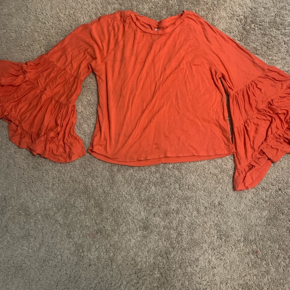 Orange 70’s flare top